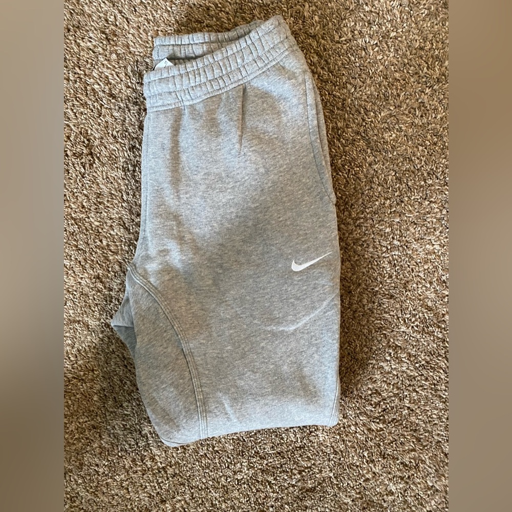 Grey and White Nike sweatpants